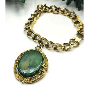 Vintage bracelet gold tone oval green stone by STAR 7" length